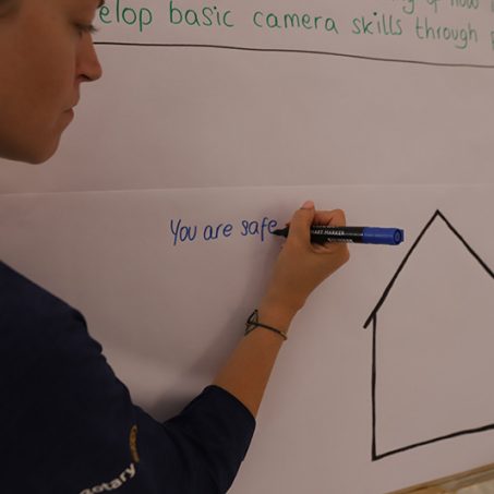 Women writing on a whiteboard