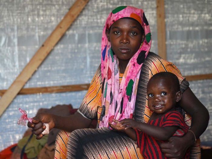 Woman and child in a home in Somalia