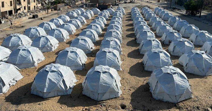 Rows of white emergency shelter tents